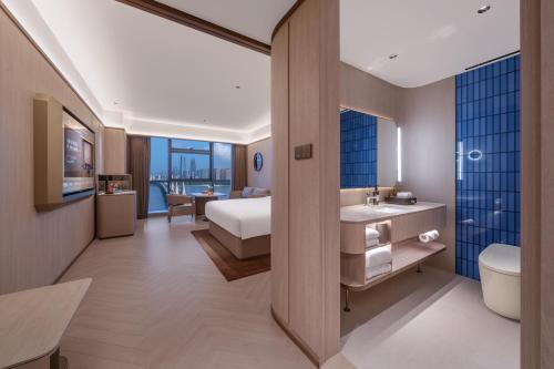 Ένα μπάνιο στο Orange Crystal Nanchang Honggutan MixC Hotel