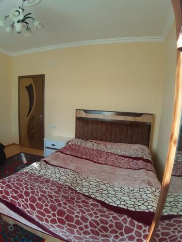 Llit o llits en una habitació de Qusar house