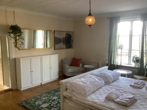 Ένα ή περισσότερα κρεβάτια σε δωμάτιο στο Augustas Bed & Breakfast