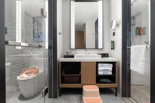 Un baño de Hampton by Hilton Kunming Railway Station