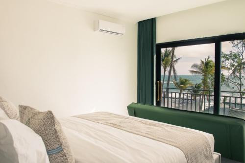 Кровать или кровати в номере Apsara Resort Koh Rong