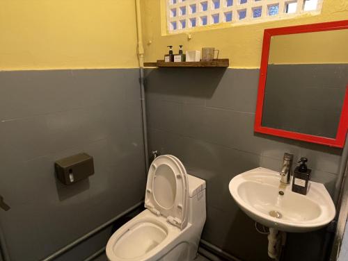 a bathroom with a toilet and a sink at 88 ngày là tới HOUSE - 88 days to go HOUSE in Da Nang