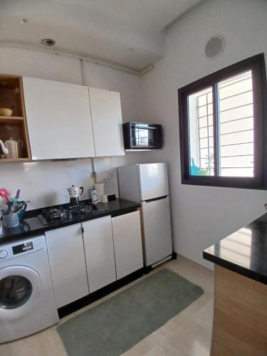 Kuchyň nebo kuchyňský kout v ubytování Majesty home