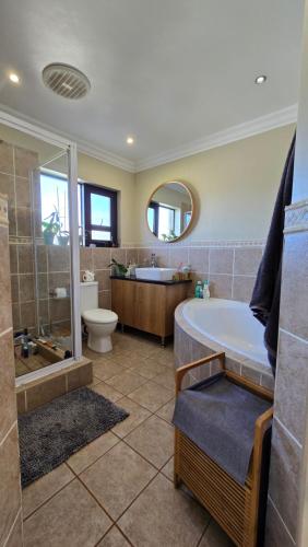 Ένα μπάνιο στο Plumeria Beach House JBay