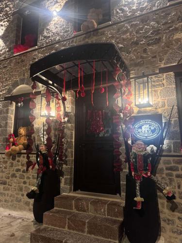 a front door of a house with christmas decorations at Maison Michelangelo in Arachova