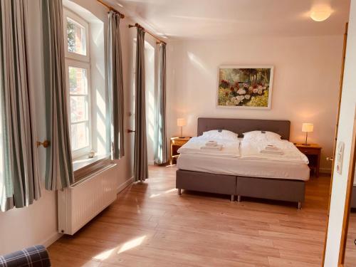 Ένα ή περισσότερα κρεβάτια σε δωμάτιο στο Pension Hessbögel