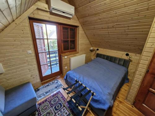 Ένα ή περισσότερα κρεβάτια σε δωμάτιο στο Colorful Life by STN