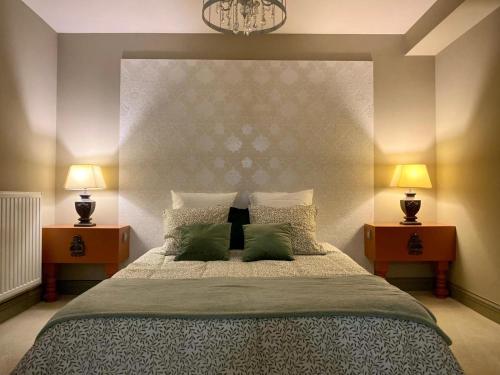 Ένα ή περισσότερα κρεβάτια σε δωμάτιο στο Chambre de La Demeure des Monts de Gy