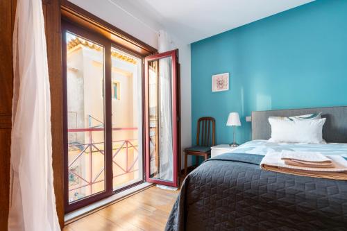 Ένα ή περισσότερα κρεβάτια σε δωμάτιο στο Casa da Bélgica