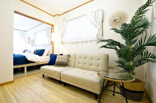 Posezení v ubytování 壺屋戸建て Tsuboya House