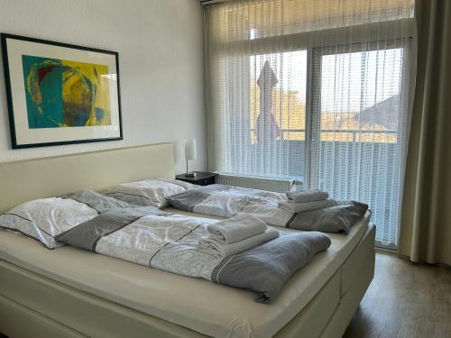 En eller flere senge i et værelse på Burgbergblick