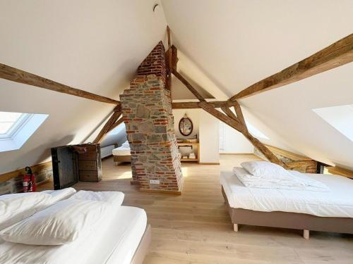 Ένα ή περισσότερα κρεβάτια σε δωμάτιο στο Charming holiday home with garden