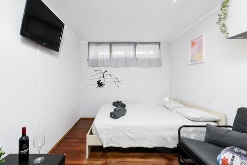 Postel nebo postele na pokoji v ubytování Sestriere - 200 mt dalle piste da sci - Monolocale