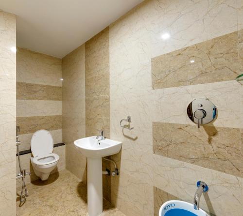 Ένα μπάνιο στο Hotel Galaxy Inn Kolhapur