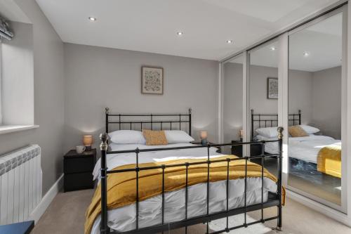 Ένα ή περισσότερα κρεβάτια σε δωμάτιο στο Roe Barn