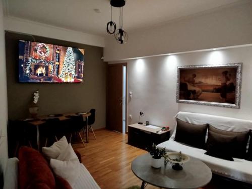 Et tv og/eller underholdning på Central glow apartment