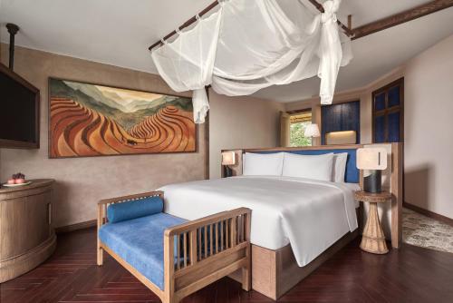 Ένα ή περισσότερα κρεβάτια σε δωμάτιο στο Garrya Mù Cang Chải