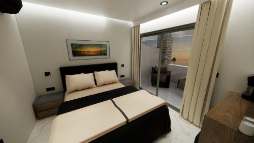 Кровать или кровати в номере Black Rocks Beach Resort