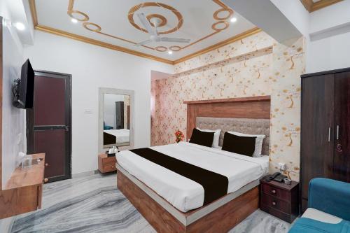 Postel nebo postele na pokoji v ubytování Collection O Digha Ghat Formerly Hotel Shahnai