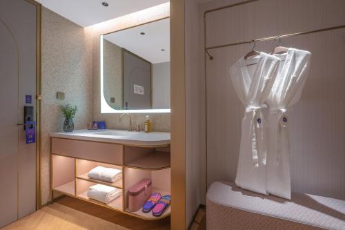 Ένα μπάνιο στο Nanyang Municipal Government Manxin Hotel