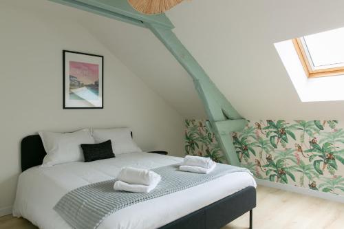 Postel nebo postele na pokoji v ubytování Villa Bel Air - Maison avec jardin, vue sur la Loire