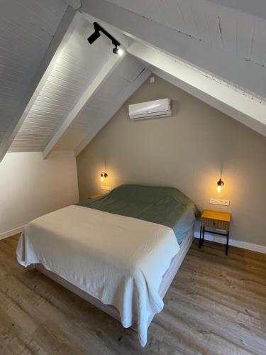 En eller flere senge i et værelse på Casita Tierra De Suerte