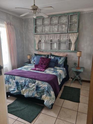 Ένα ή περισσότερα κρεβάτια σε δωμάτιο στο Tweni Strandloper Cottage