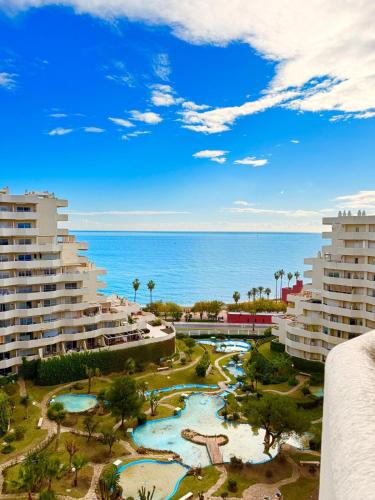 Charming Apartment in Benalbeach with Garden and Sea View