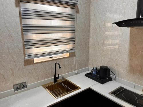 Φωτογραφία από το άλμπουμ του Cozy GRA 1BR Apt by Asaba Specialist Hospital στην Asaba