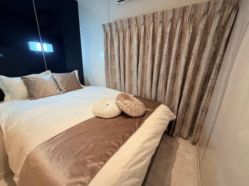 Ένα ή περισσότερα κρεβάτια σε δωμάτιο στο Ray House