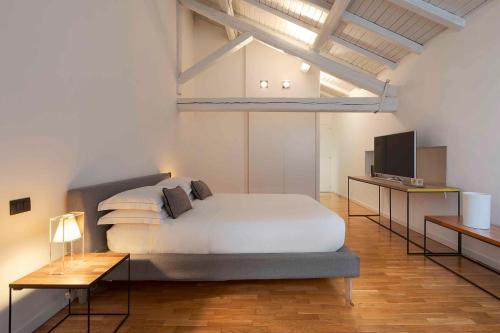 Ένα ή περισσότερα κρεβάτια σε δωμάτιο στο Habitat Boutique Hotel