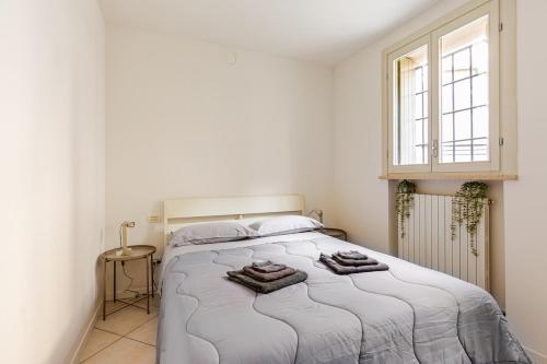 Ένα ή περισσότερα κρεβάτια σε δωμάτιο στο San Sisto Apartment