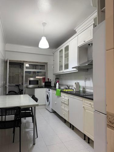 Η κουζίνα ή μικρή κουζίνα στο Bliss