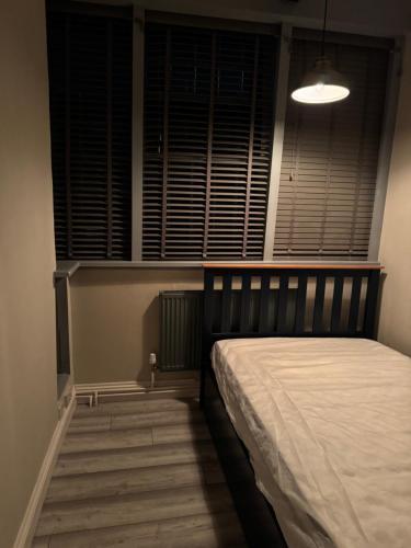 Ένα ή περισσότερα κρεβάτια σε δωμάτιο στο The workshop