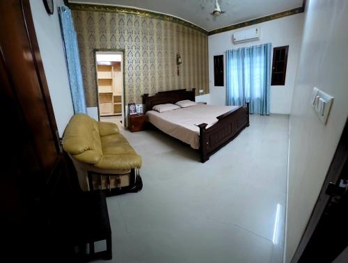 Postel nebo postele na pokoji v ubytování Marakkar villa