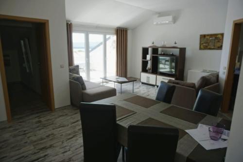 TV a/nebo společenská místnost v ubytování Nara Homes