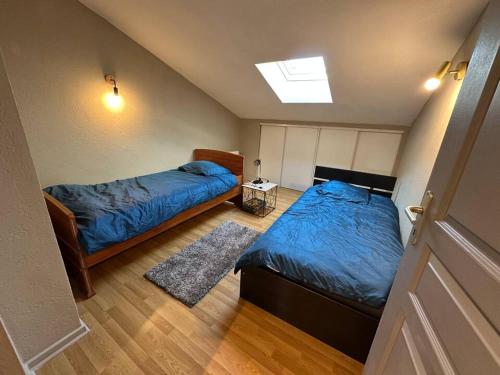 Postel nebo postele na pokoji v ubytování La belle échappée