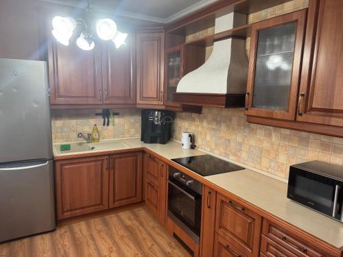 Η κουζίνα ή μικρή κουζίνα στο Kékmadár Wellness Apartman Kalocsa