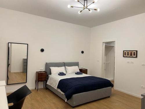 Ένα ή περισσότερα κρεβάτια σε δωμάτιο στο Trieste Centrale Luxury Apartament in stile moderno