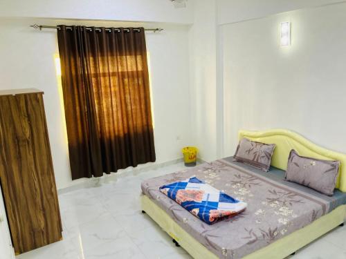 Postel nebo postele na pokoji v ubytování Alsadek Guest House