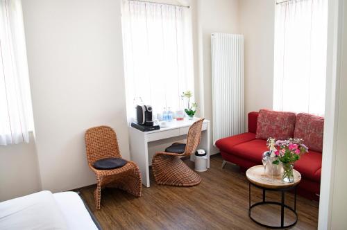 Χώρος καθιστικού στο Hosser's Hotel Restaurant