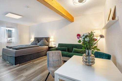 Giường trong phòng chung tại Motel Ambiente 3- Luxus Studio