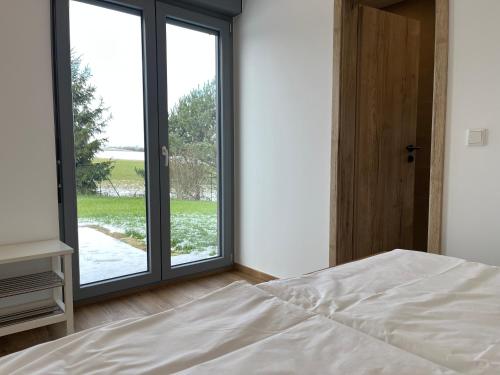 Ένα ή περισσότερα κρεβάτια σε δωμάτιο στο 4-Steine-Blick, Wohnung 3