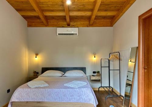 Ένα ή περισσότερα κρεβάτια σε δωμάτιο στο Cubo House