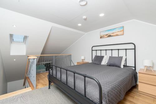 Postel nebo postele na pokoji v ubytování Kalma 7 Apartments