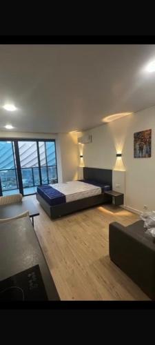 Postel nebo postele na pokoji v ubytování Walking distance to everywhere in the center of Batumi