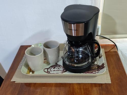 Příslušenství pro přípravu čaje a kávy v ubytování Monoambiente Eldorado 1