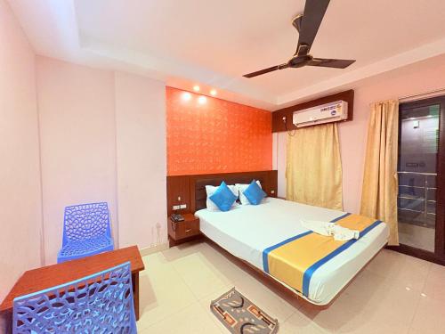 Postel nebo postele na pokoji v ubytování Bong Prince Near The New Digha Sea Beach