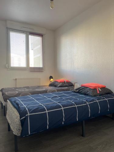 Llit o llits en una habitació de Square Walliser près ZENITH