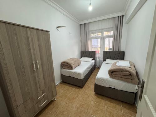 Ένα ή περισσότερα κρεβάτια σε δωμάτιο στο Alanya appartement